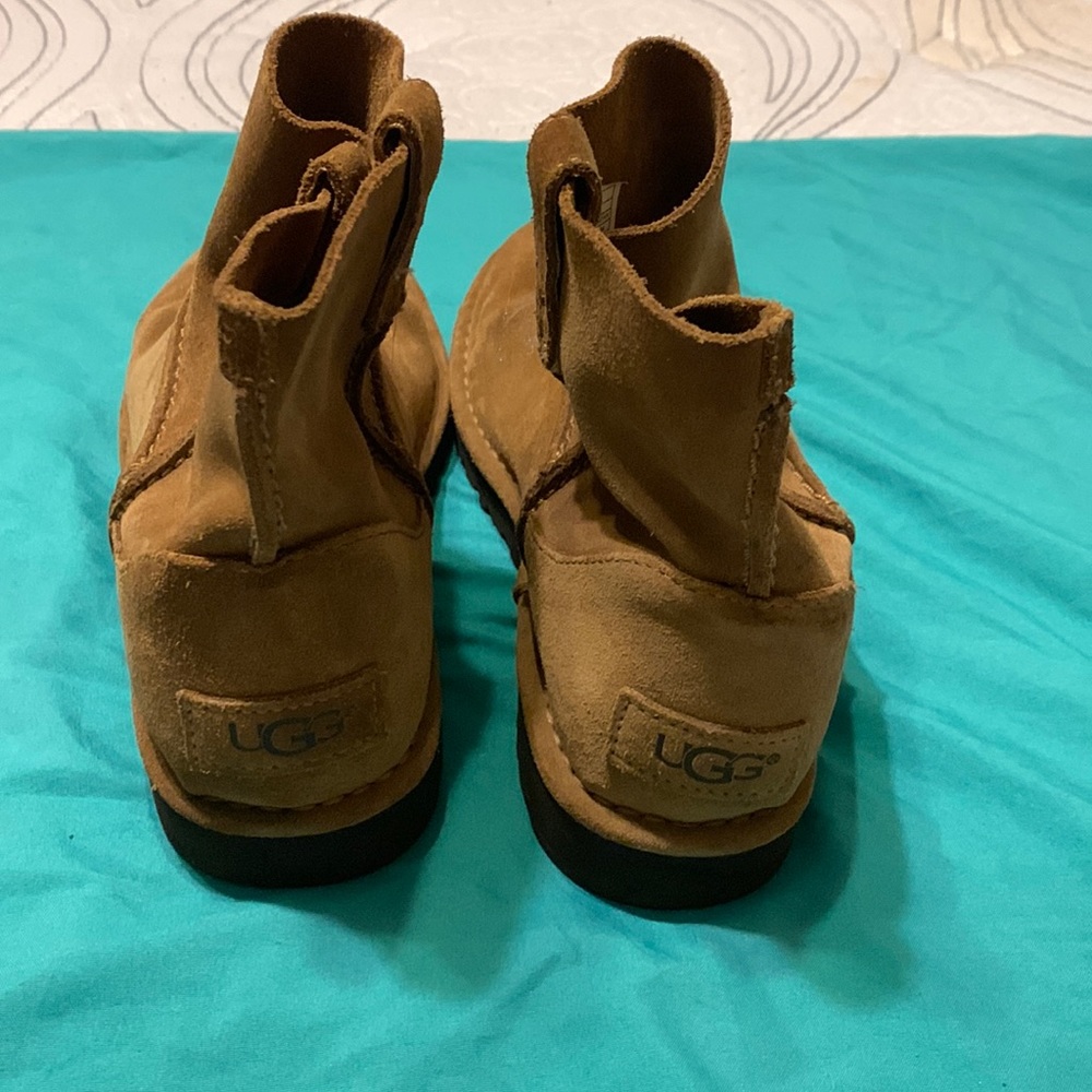 UGG brown unlined bootie size 7m.